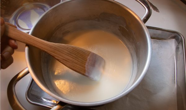 A stainless bowl with the thickened milk ready to be used for filling the kunafa